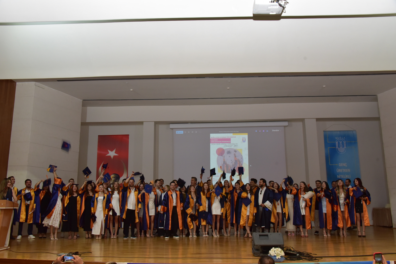 Aviation Management Department Students Throw Their Caps!